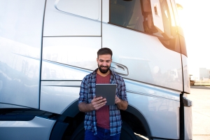 Delivery Route Planner standing in front of a truck